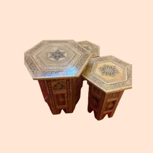 Small wooden tables incrustrated